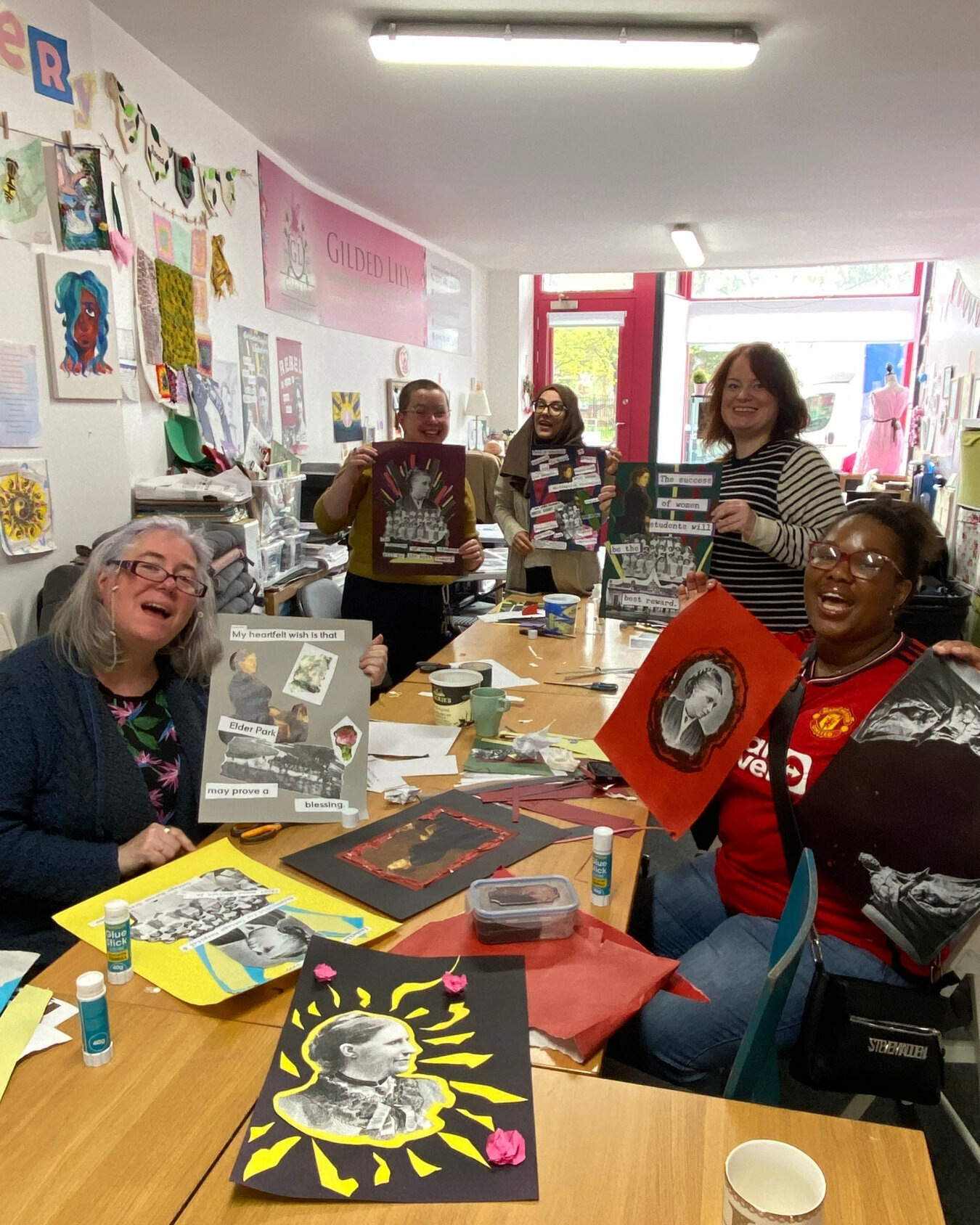 Participants at a Gilded Lily mural workshop.